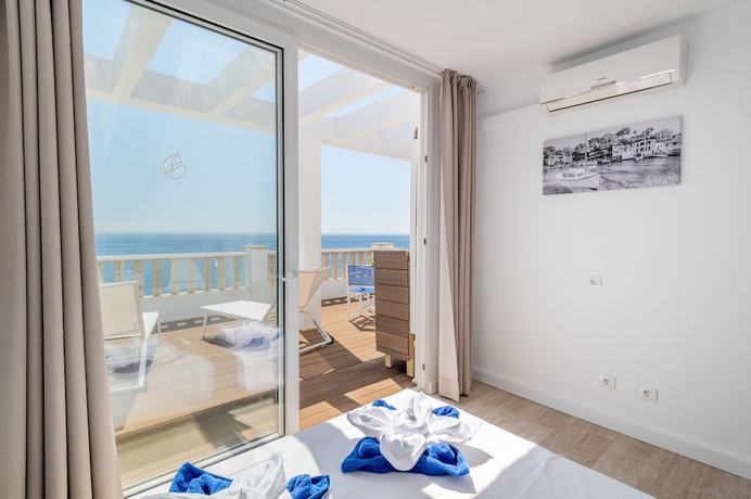 Imagen de la habitación del Hotel Orange Colom Seaside Apartments, Cala Mar&ccedil;al. Foto 9