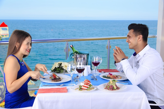 Imagen del bar/restaurante del Hotel Orange County Kemer. Foto 11