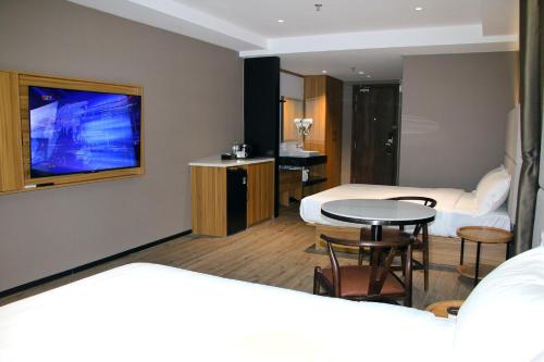 Imagen general del Hotel Orange Crystal Phoenix hotel. Foto 11