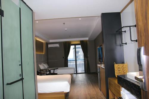 Imagen de la habitación del Hotel Orange Crystal Phoenix hotel. Foto 19