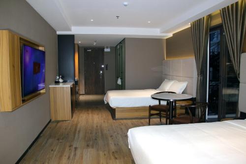 Imagen general del Hotel Orange Crystal Phoenix hotel. Foto 17