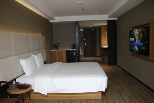 Imagen de la habitación del Hotel Orange Crystal Phoenix hotel. Foto 20