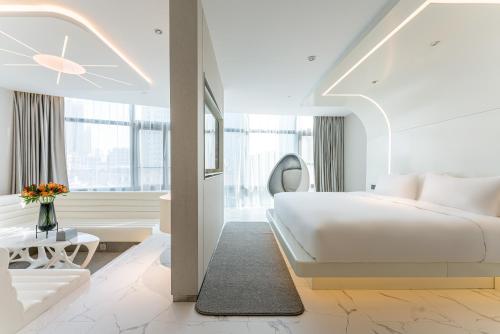 Imagen de la habitación del Hotel Orange Crystal Shanghai Bund North Sichuan Road. Foto 13