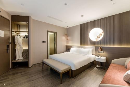 Imagen de la habitación del Hotel Orange Crystal Shanghai Bund North Sichuan Road. Foto 18