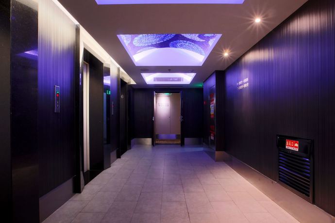 Imagen de los interiores del Hotel Orange Crystal Wusi Square Seaview. Foto 12
