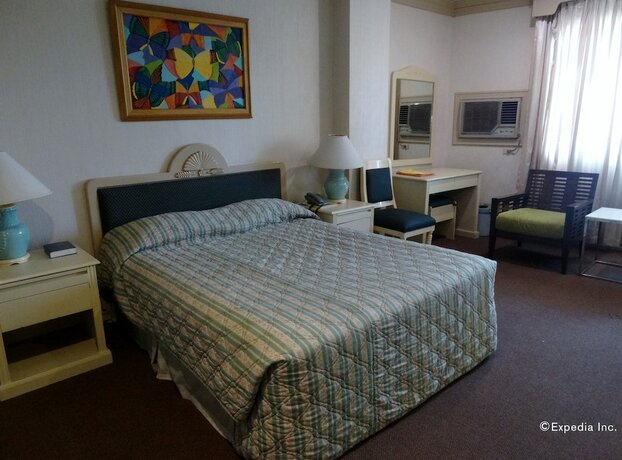 Imagen de la habitación del Hotel Orange Grove. Foto 17