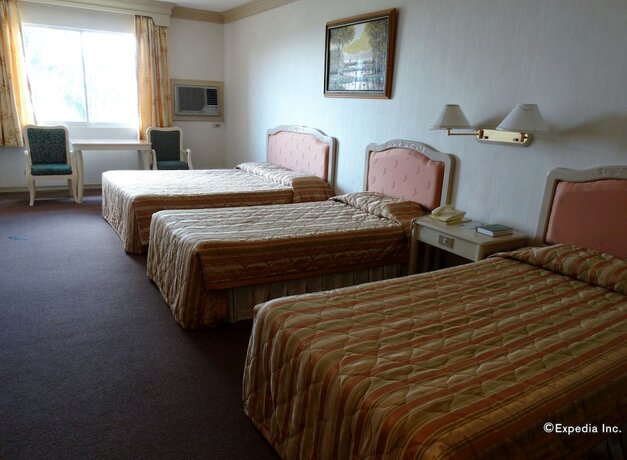 Imagen de la habitación del Hotel Orange Grove. Foto 18