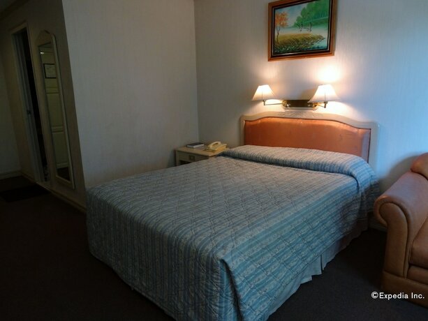 Imagen de la habitación del Hotel Orange Grove. Foto 19