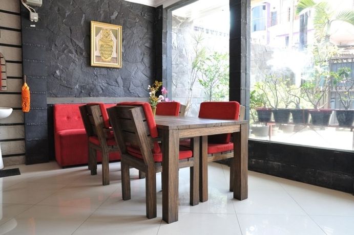 Imagen del bar/restaurante del Hotel Orange Home Syariah. Foto 5