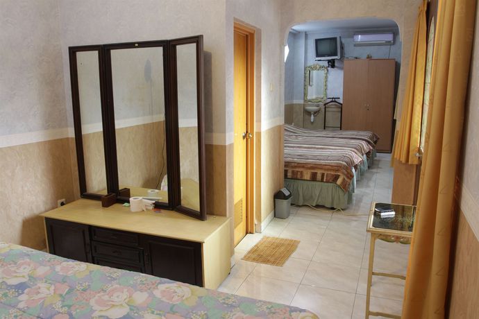 Imagen de la habitación del Hotel Orange Home Syariah. Foto 9