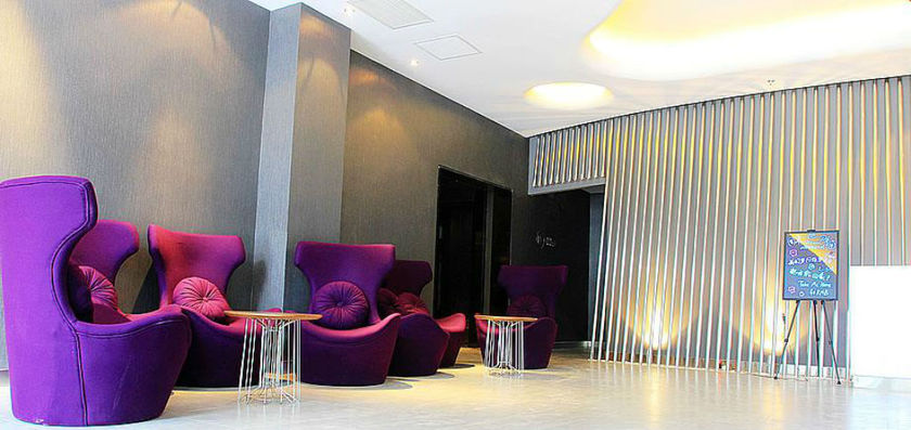 Imagen de los interiores del Hotel Orange Hotel Select Qingdao Wusi Square. Foto 13