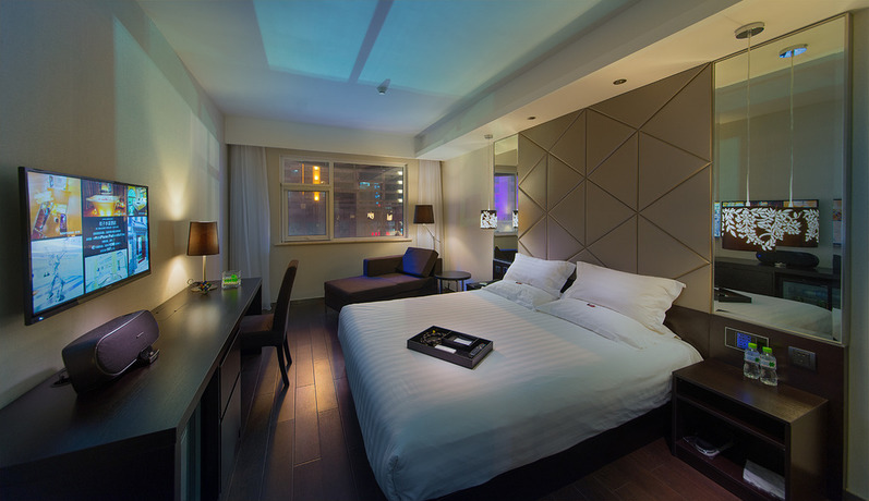 Imagen de la habitación del Hotel Orange Hotel Select Qingdao Wusi Square. Foto 5
