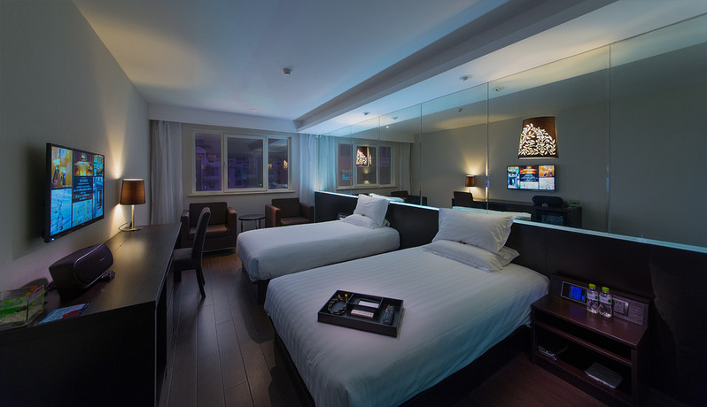 Imagen de la habitación del Hotel Orange Hotel Select Qingdao Wusi Square. Foto 6