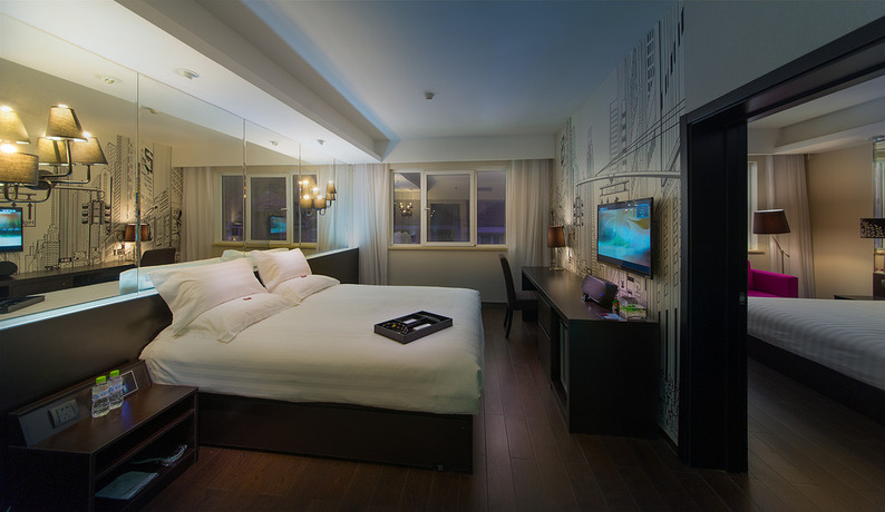 Imagen de la habitación del Hotel Orange Hotel Select Qingdao Wusi Square. Foto 8