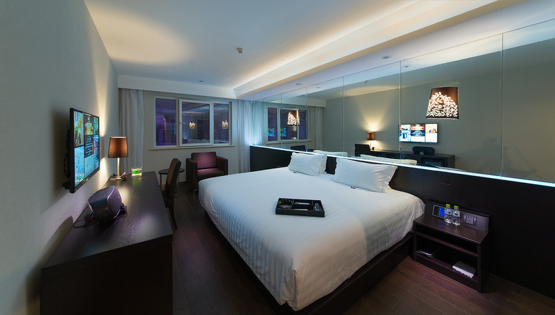Imagen de la habitación del Hotel Orange Hotel Select Qingdao Wusi Square. Foto 9
