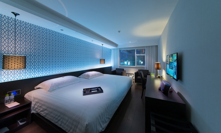 Imagen de la habitación del Hotel Orange Hotel Select Qingdao Wusi Square. Foto 10