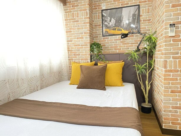 Imagen de la habitación del Hotel Orange House, Osaka. Foto 34