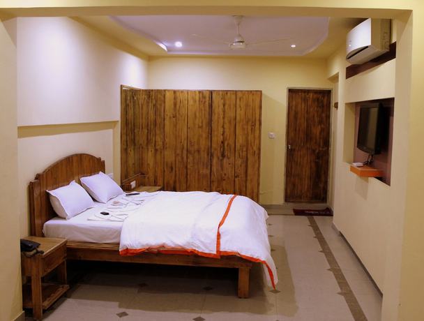 Imagen de la habitación del Hotel Orange Inn, Ahmedabad. Foto 8