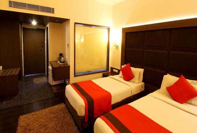 Imagen de la habitación del Hotel Orange Inn, Ahmedabad. Foto 9