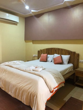 Imagen de la habitación del Hotel Orange Inn, Ahmedabad. Foto 10