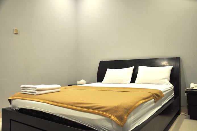 Imagen de la habitación del Hotel Orange Inn Hotel Mangga Besar. Foto 2