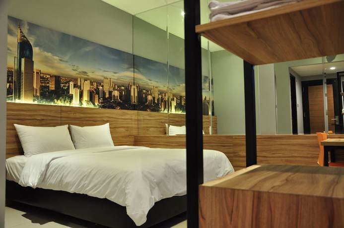 Imagen de la habitación del Hotel Orange Inn Hotel Mangga Besar. Foto 3