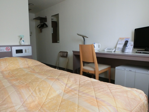 Imagen de la habitación del Hotel Orange Inn Sendaihigashi. Foto 5