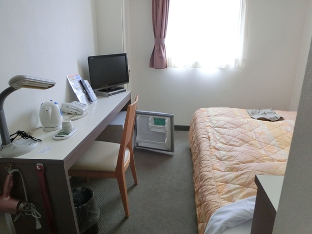Imagen de la habitación del Hotel Orange Inn Sendaihigashi. Foto 10