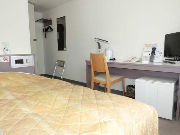 Imagen de la habitación del Hotel Orange Inn Sendaihigashi. Foto 11