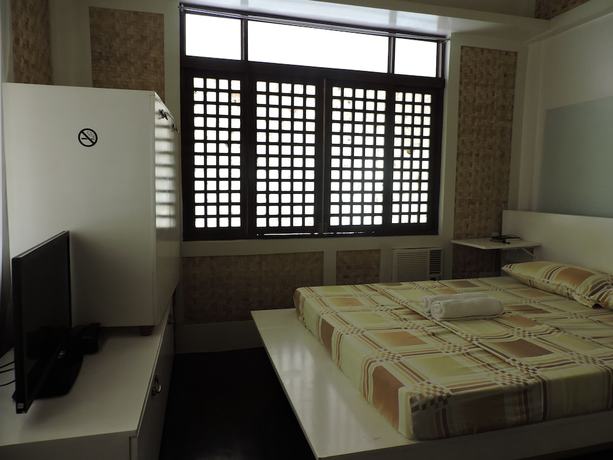 Imagen de la habitación del Hotel Orange Mangrove Pension House. Foto 3