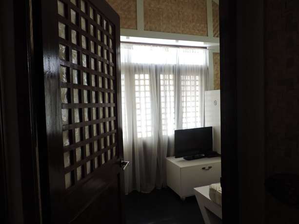 Imagen de la habitación del Hotel Orange Mangrove Pension House. Foto 12