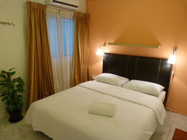 Imagen de la habitación del Hotel Orange Pekoe Guesthouse. Foto 9
