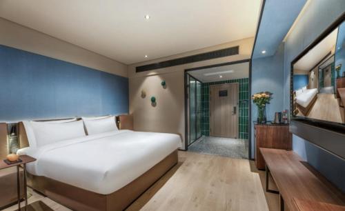 Imagen general del Hotel Orange - Taicang Nanyang Plaza. Foto 2