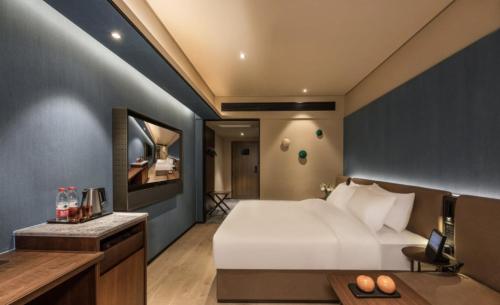 Imagen de la habitación del Hotel Orange - Taicang Nanyang Plaza. Foto 19