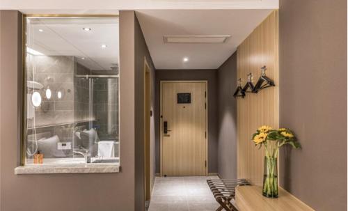 Imagen general del Hotel Orange - Taicang Nanyang Plaza. Foto 9