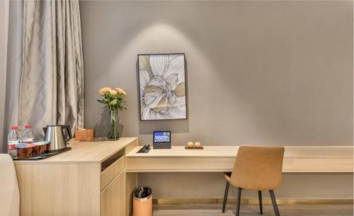 Imagen general del Hotel Orange - Taicang Nanyang Plaza. Foto 11