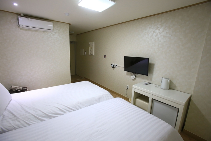 Imagen de la habitación del Hotel Orange Tree Hotel and Cafe. Foto 5