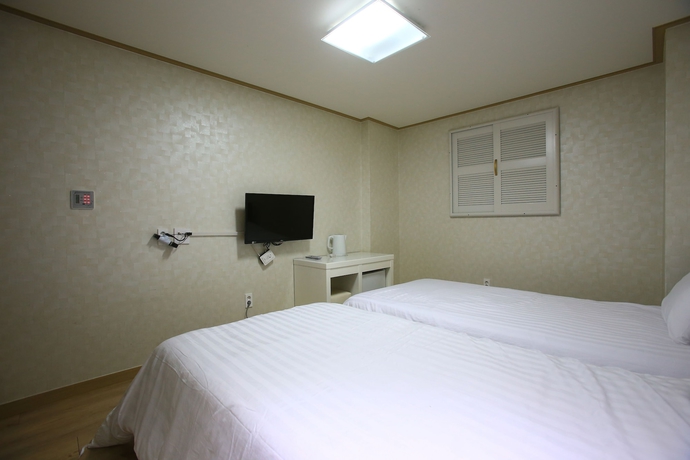 Imagen de la habitación del Hotel Orange Tree Hotel and Cafe. Foto 6