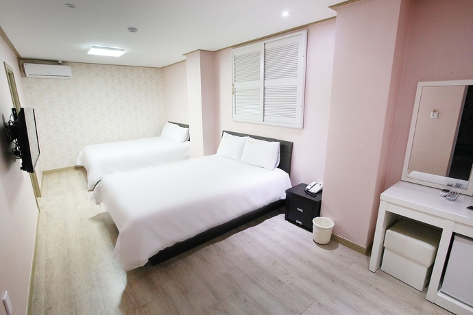 Imagen de la habitación del Hotel Orange Tree Hotel and Cafe. Foto 9