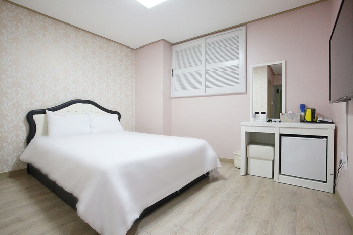 Imagen de la habitación del Hotel Orange Tree Hotel and Cafe. Foto 11
