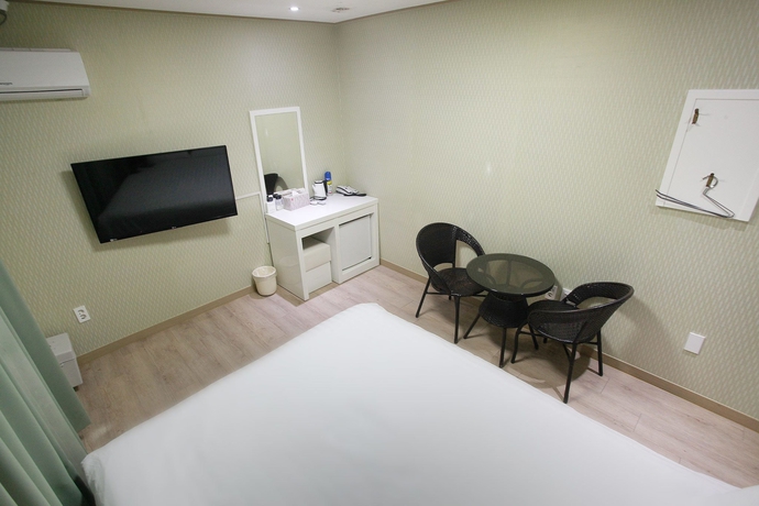 Imagen de la habitación del Hotel Orange Tree Hotel and Cafe. Foto 17