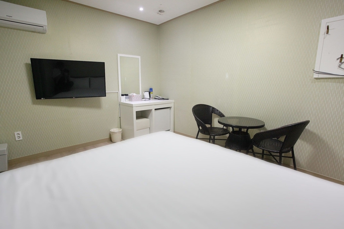 Imagen de la habitación del Hotel Orange Tree Hotel and Cafe. Foto 18