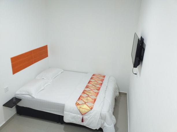 Imagen de la habitación del Hotel Orange Villa. Foto 19