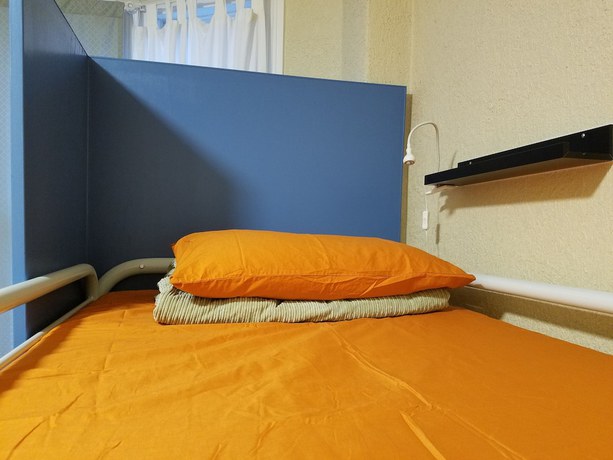 Imagen de la habitación del Hotel Orange Village Hostel. Foto 5