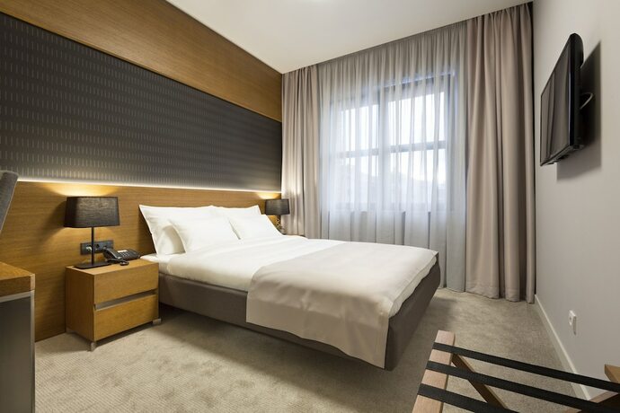 Imagen de la habitación del Hotel Orasac Garni. Foto 15