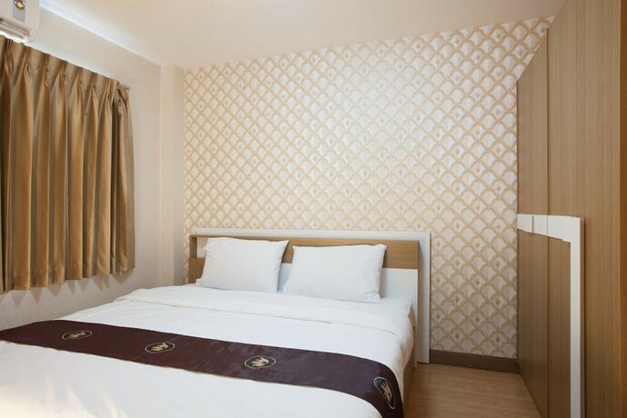 Imagen de la habitación del Hotel Orawan Suites. Foto 18