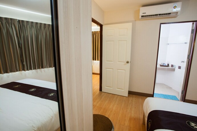 Imagen de la habitación del Hotel Orawan Suites. Foto 19