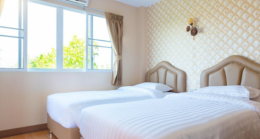 Imagen de la habitación del Hotel Orawan Suites. Foto 26