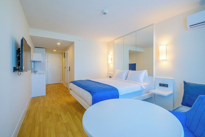 Imagen de la habitación del Hotel Orbi City Official D Block. Foto 19