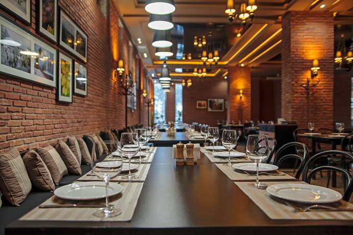 Imagen del bar/restaurante del Hotel Orbi Palace and Suites. Foto 3